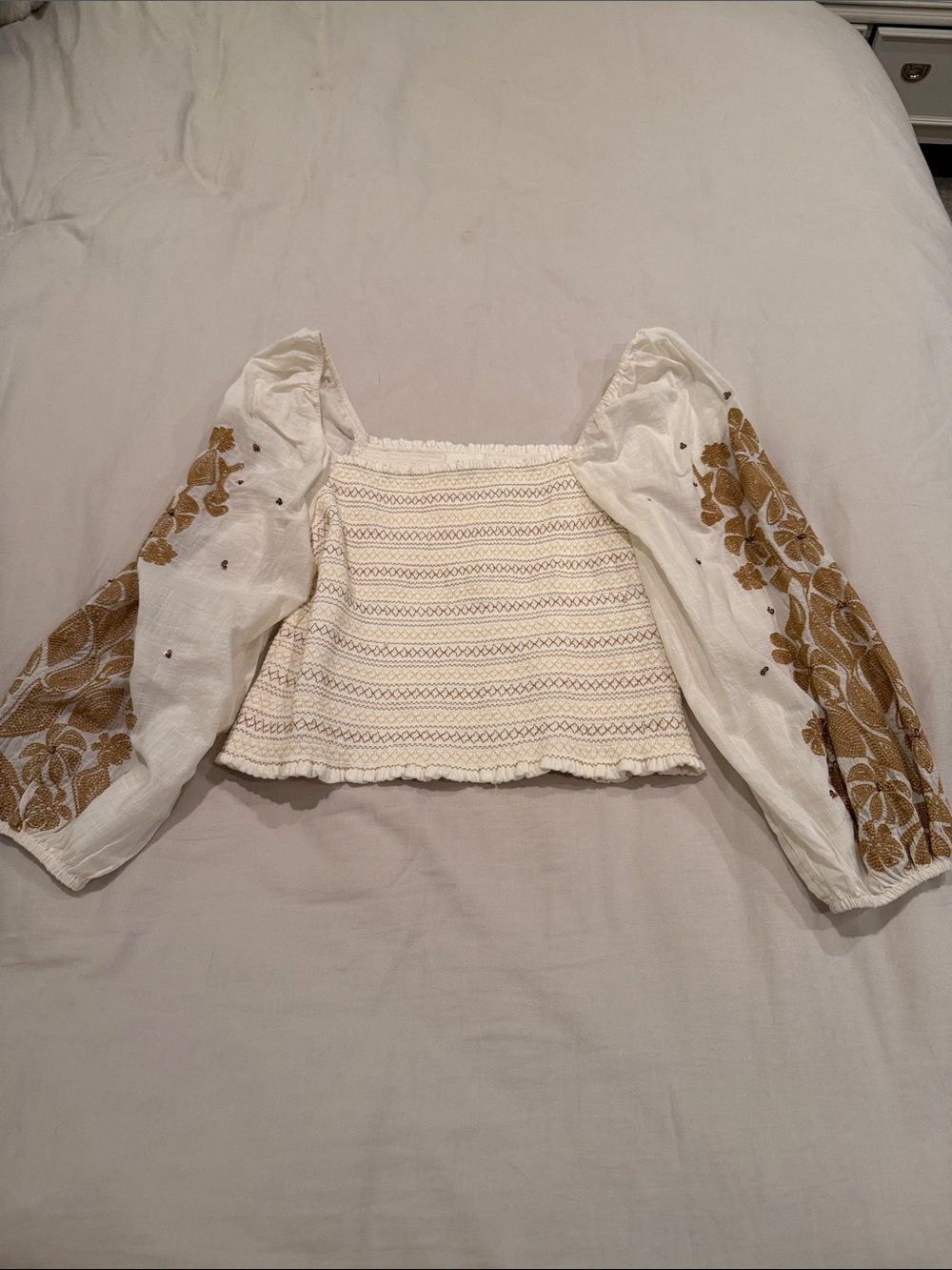 Anthropologie White Cropped Smocked Top with Mustard Floral Sleeves